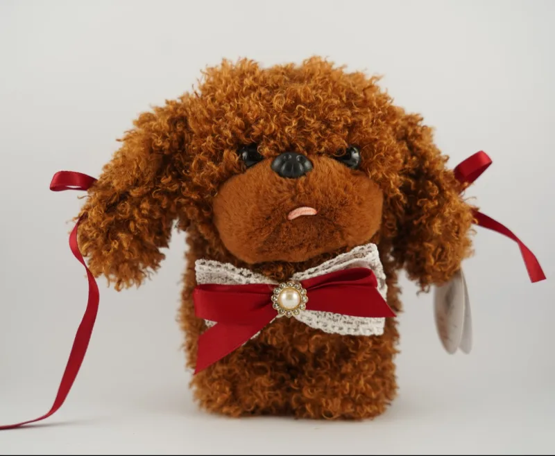 PELUCHE PERRITO CANICHE CON LAZO